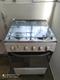 Vendo Cocina Esmaltec de gas, con 4 hornillas y horno 